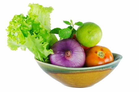 Fresh mixed vegetables on ceramic bowlの写真素材