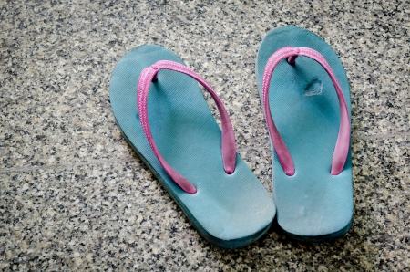 Vintage Summer Footwear with plasstic black and white  backgroundの写真素材