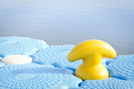 Yellow anchor abd Blue harbor with  Lake background の写真素材