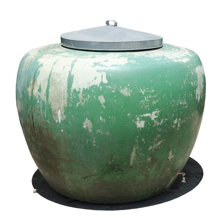 big green jar with metal top cpver , isolated on a white backgroundの写真素材