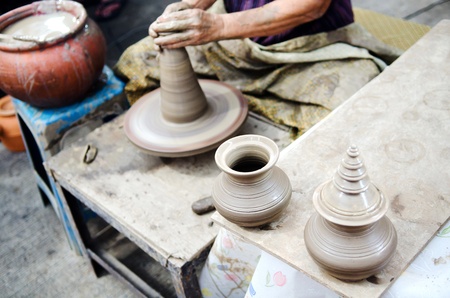 potter man hands shaping ceramic craft, Khun-Ream water market , Thailandの写真素材