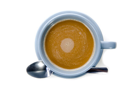 Cup of Coffee with spoon isolate on white background . の写真素材