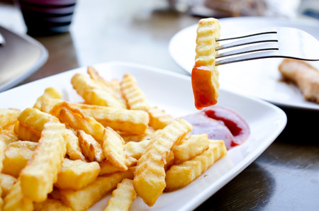 Golden French fries potatoes ready to be eaten