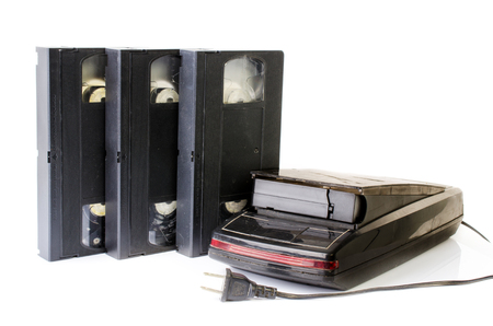 Video Cassette and Vintage Rewinder isolate on white backgroundの写真素材