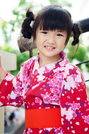 Little asian child in japanese traditional costume, kimono  . の写真素材