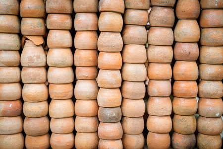 Stack of Orange cerenic Pot Background.の写真素材