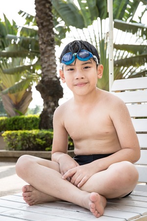 Portrait of happy asian little boy ready to swimmingの写真素材