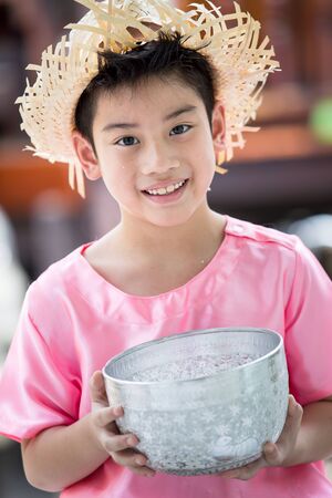 Cute Asian boy smiling ,thai suitの写真素材