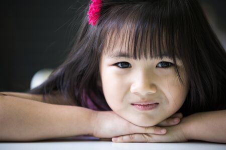 Portrait of happy asian cute Girl ,smile and look at cameraの写真素材