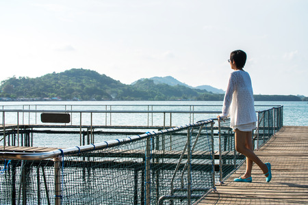 Young asian woman on summer vacation. Travel and adventure conceptの写真素材