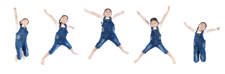 Group of Asian cute child is jumping on white backgroundの写真素材