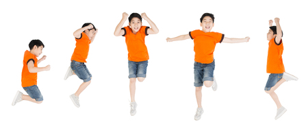 Asian cute boy are jumping with smile face ,Isolated on white backgroundの写真素材