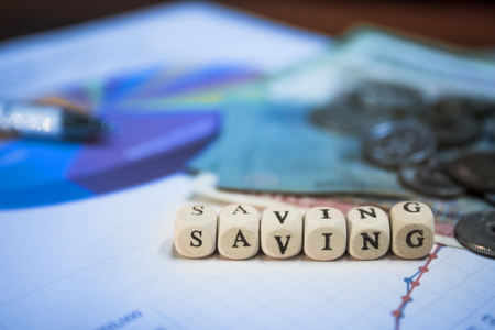Business Finance and cube dices with word Savingの写真素材
