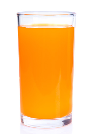 Orange juice glass, isolated on white backgroundの写真素材