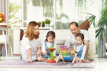 Happy asian family father enjoying with child, Family lifestyle at homeの写真素材