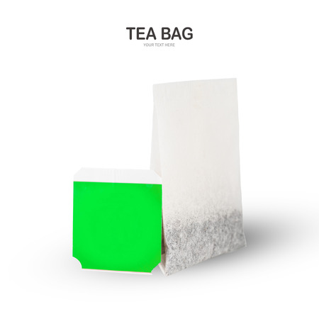 Creative layout made of White tea bag with green label isolated on white background  . Green Tea with copy space.の写真素材