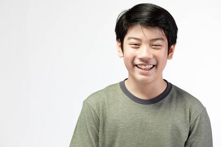 Portrait of look good asian kid isolated on white background.の写真素材