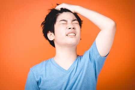 Portrait of asian little boy Upset and angry , concept for anger, frustration and mischief. isolate...