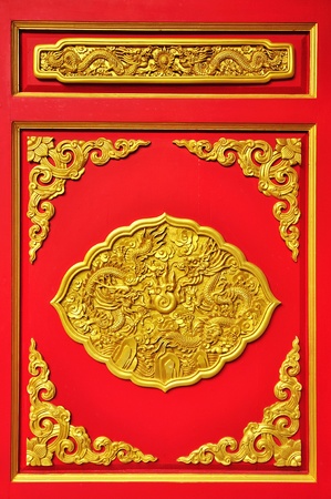 Golden dragon sculpture on ceiling at Chinese Temple, Bangkok, Thailand の写真素材