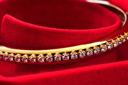 Diamond on the golden bracelet の写真素材