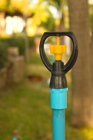 Sprinkler water truck is used for trees and gardens.の写真素材