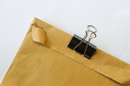 Brown envelope on a white background.