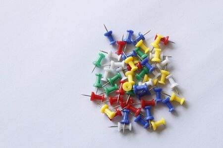 Collection of various pushpins on white backgroundの写真素材