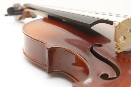 Violin instrument close up on white backgroungの写真素材