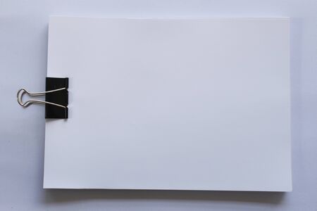 White blank paper cliper on white backgroundの写真素材