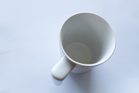 a white coffee cup on white backgroundの写真素材