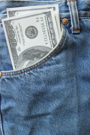 money in front-pocket of jeansの写真素材