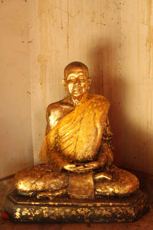 ancient buddha statue in thai templeの写真素材