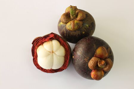 Tropical fruit Mangosteen isolated on white backgroundの写真素材