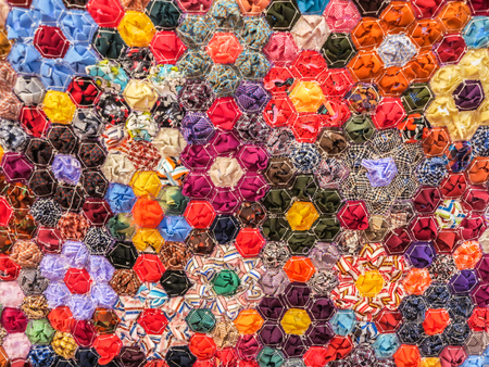 Patterns of fabric pieces come togetherの写真素材