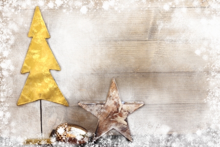 Christmas tree and star on wooden backgroundの写真素材