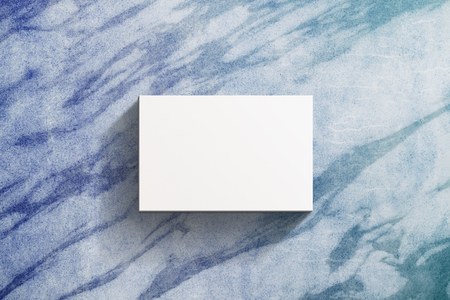 Business Card Mockup present over the marble table, Blank white paper, Top viewの写真素材