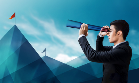 Business Vision and Leadership Concept, Businessman Looking or Searching for Success Victory Flag at...