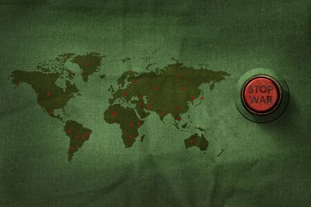Stop War Concept, Button to push on World Map Military Fabric Texture background