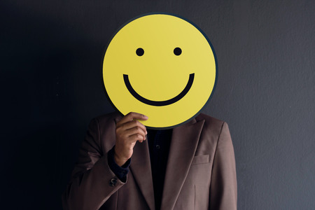 Customer Experience Concept, Portrait of Client with Happy Face Feeling, Drawn Emotion on Paperの写真素材