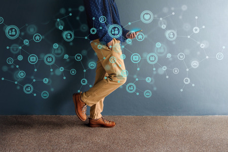 Network Connection in Daily Life Concept. Person Walking and Connecting Things via Smartphone....