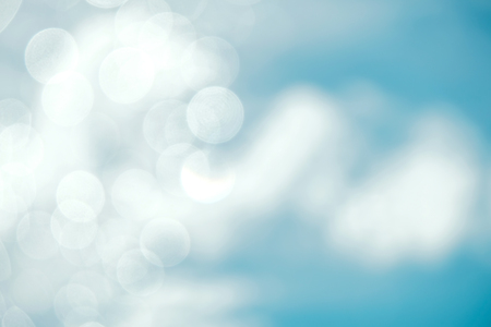 Blue Sky and Clouds on Sunny Day with Bokeh and Flair Lightingの写真素材