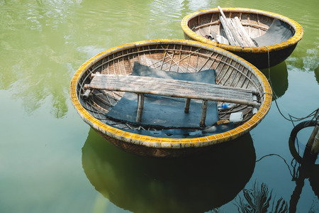 Traditional Round Basket Boat at the Pier. Favorite Activities for Tourist in Hoi An, Vietnamの写真素材