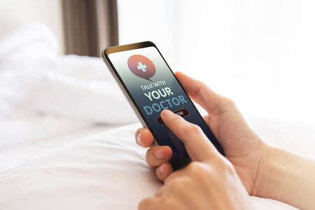 Helathy Lifestyle and Technology Concept. Modern Person Using Online Medicine Application via Mobile...