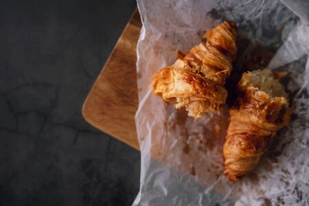 Fresh Croissant Lay on the Cement Table. Breakfast Bakery Light Meal. Top View