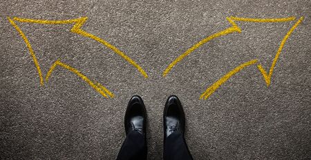 Decision in Life or Business Concept. Businessman Standing on the Left and Right Arrow Direction. Top View