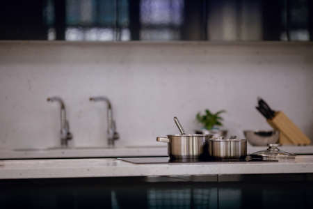 Modern Kitchen. selecive focus on Stainless Steel Potの写真素材