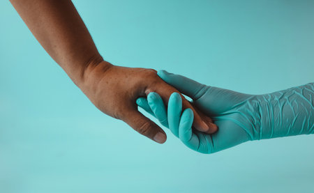 PTSD Mental Health, Encouraging Concept. Hand of Doctor or Therapist Supporting and Touching a Patient with Love and Care. Comfortable Medical Hand Gloveの写真素材