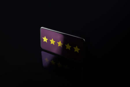 Customer Experiences Concept. Five Star Rating on Mobile Phone Screen. Positive Feedback Review on...
