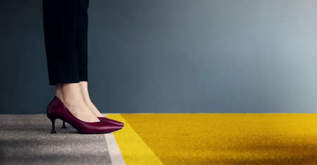Start Concept. Woman Power. Low Section of Business Female Standing on Start Line for Moving Forward to New Challenge. Cropped Image. Side View. Business Strategy, Metaphor Conceptualの写真素材