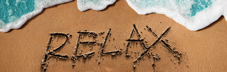 Relaxation by the Nature Concept. Relax text on Sand Beach with Soft Blue Wave on Summer Sunny Day. Top Viewの写真素材
